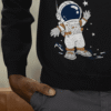 Astronaut Graphic Black Sweatshirt for Men – Streetwear by Leversi Men’s black astronaut graphic sweatshirt by Leversi