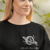 Dream Big Like The Universe Sweatshirt – Women’s Black Oversized Fit | Leversi Woman wearing black “Dream Big Like The Universe” sweatshirt by Leversi
