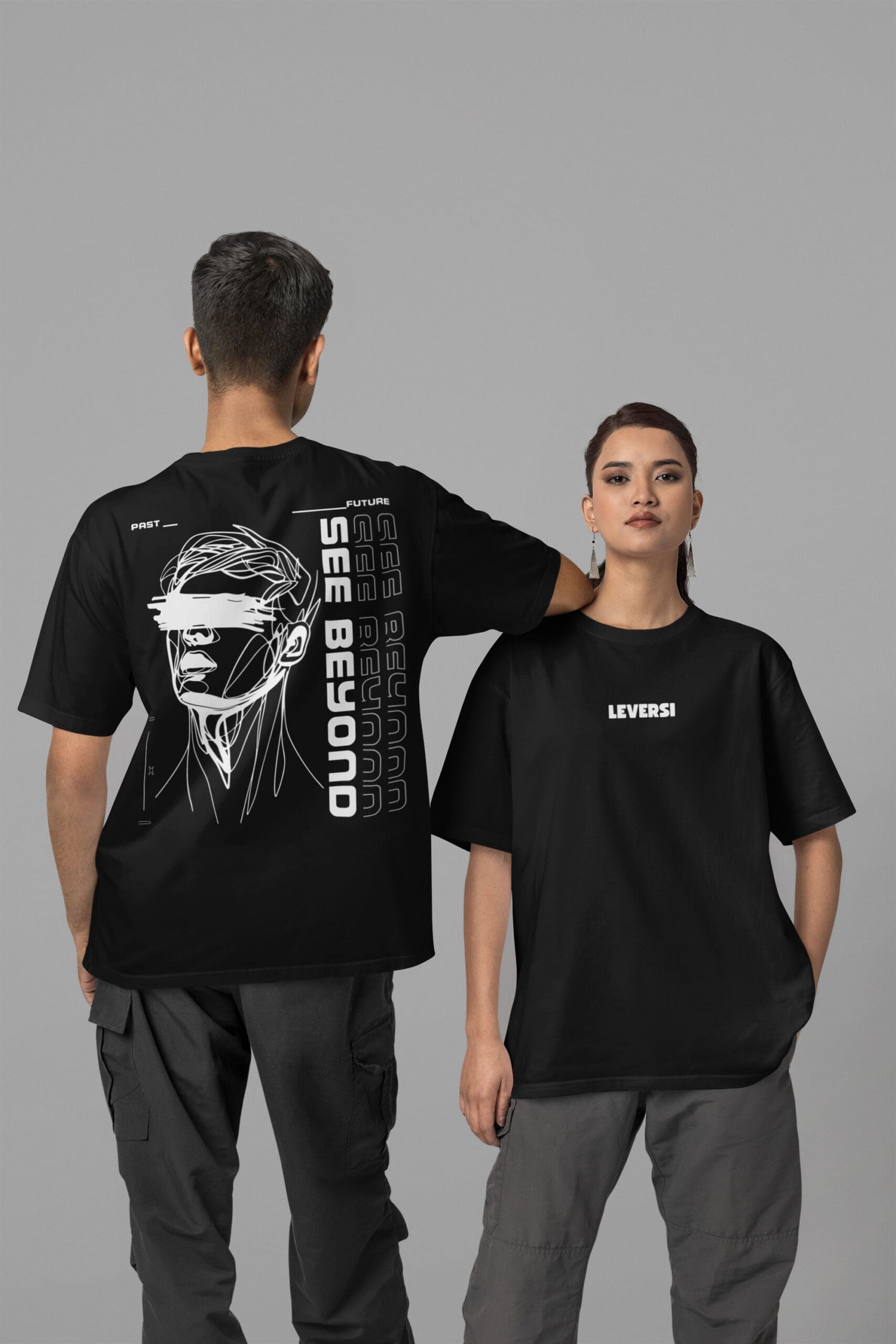 front-and-back-view-mockup-of-a-man-and-a-woman-wearing-blinkstore-t-shirts-in-a-studio-m3