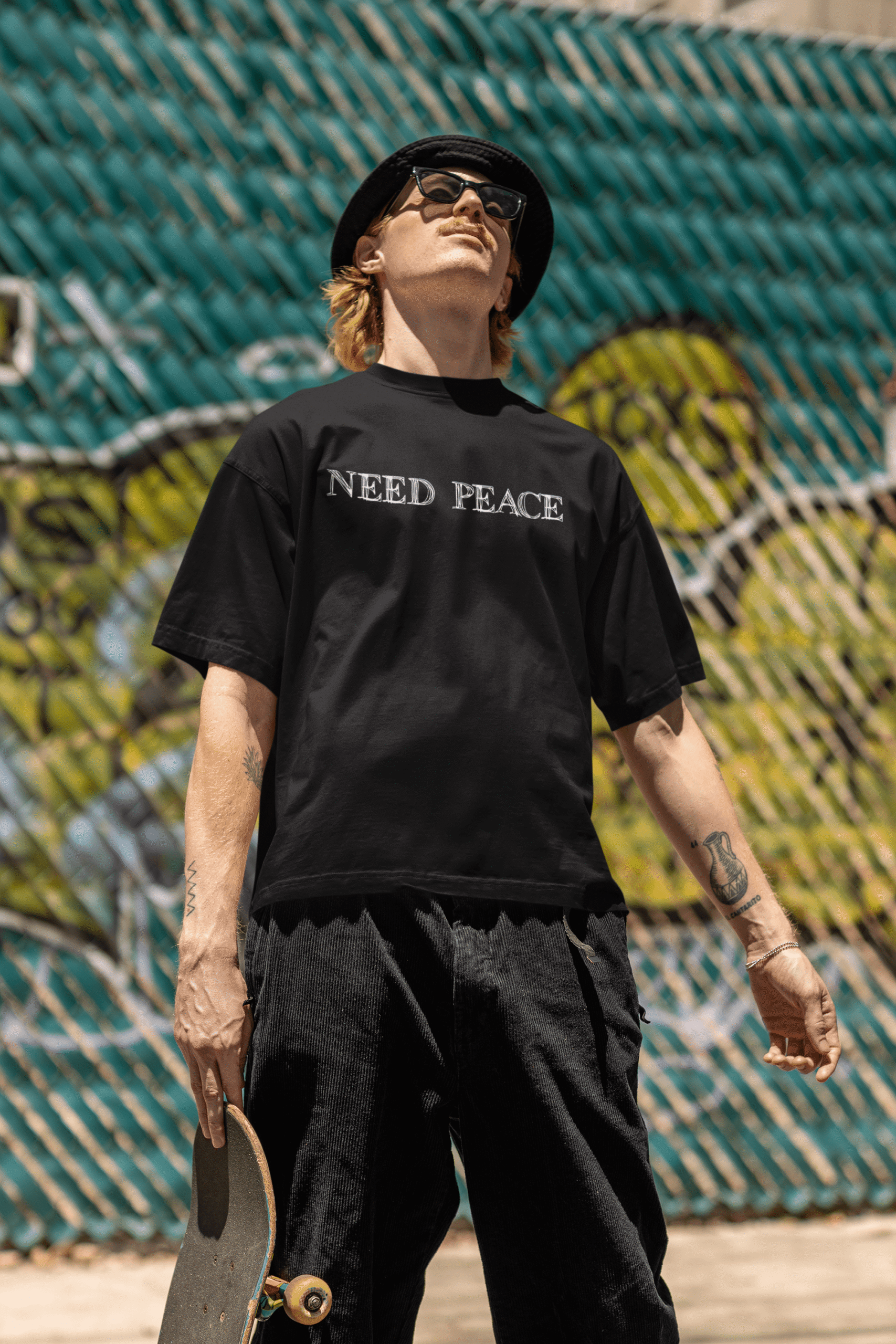 hip-hop-inspired-mockup-of-a-man-wearing-an-oversized-round-neck-t-shirt-m39245 (3)