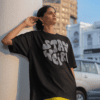 oversized-blinkstore-tee-mockup-of-a-woman-leaning-against-a-column-m39161 (1)