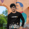 Man wearing black “Future” graphic sweatshirt posing outdoors with a mural background