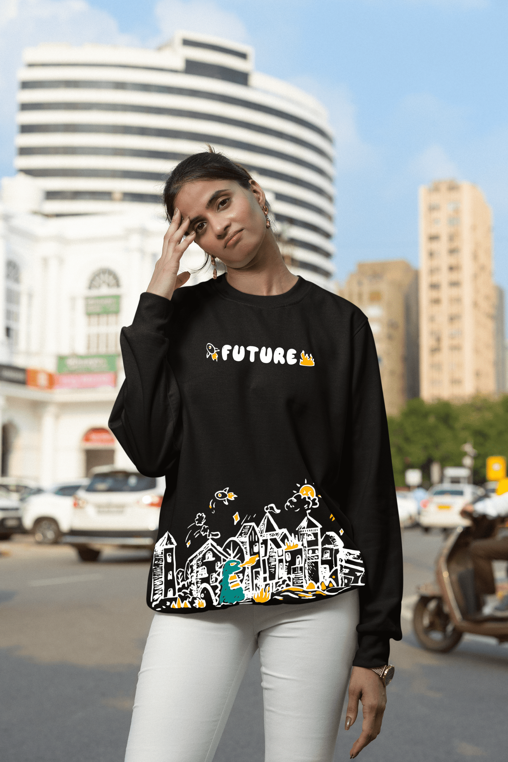 Woman wearing black “Future” graphic sweatshirt posing on a city street