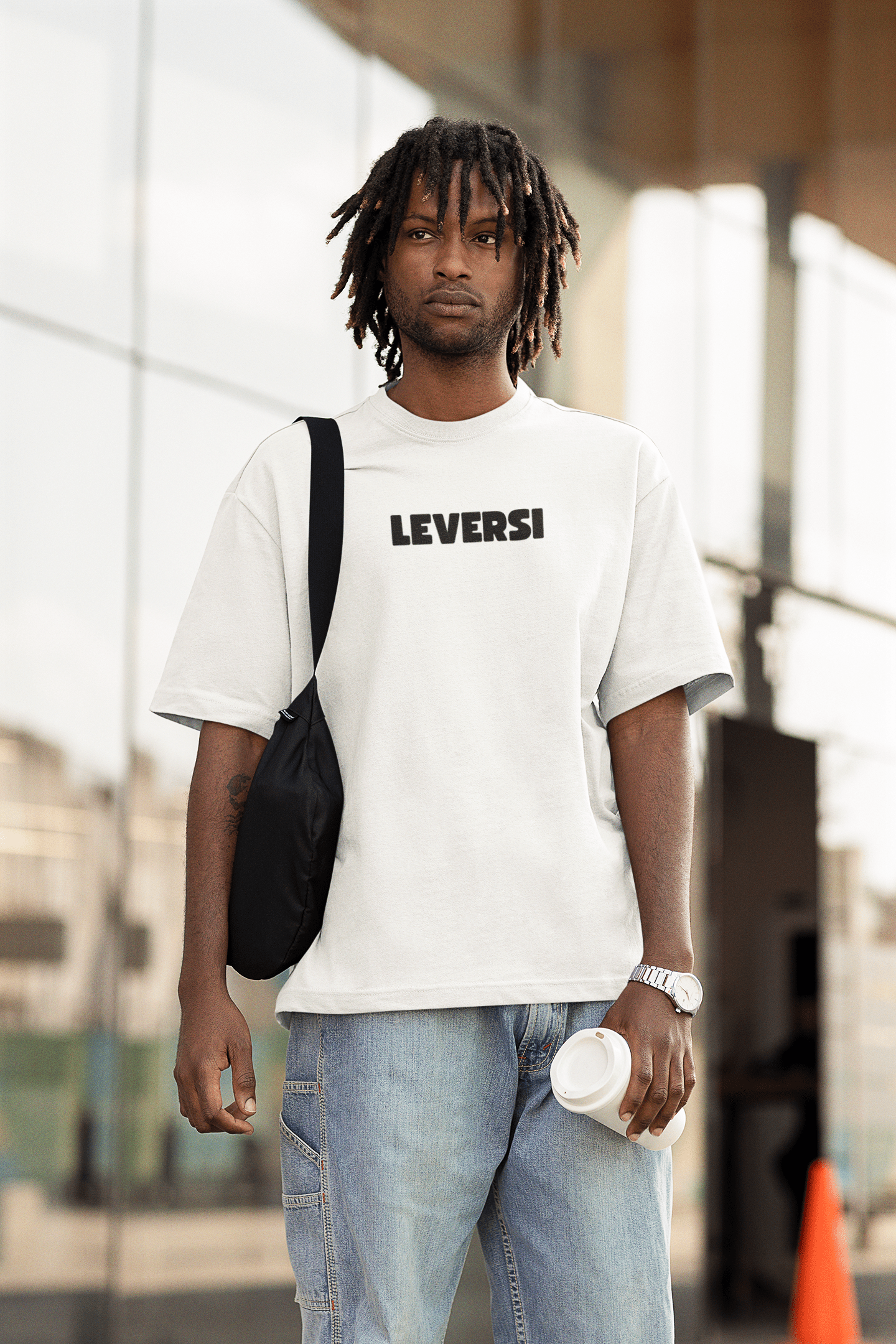 mockup-of-a-man-wearing-an-oversized-t-shirt-on-the-street-m25217