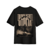 Black T-shirt featuring a large sepia-toned graphic on the back with the text “TRAVIS SCOT T UTOPIA,” showing a silhouette of a performer standing on a smoky, cloud-like stage.