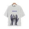 White BREATHE graphic T-shirt with blue abstract hand artwork displayed on a hanger.
