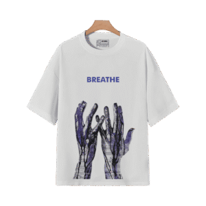 White BREATHE graphic T-shirt with blue abstract hand artwork displayed on a hanger.