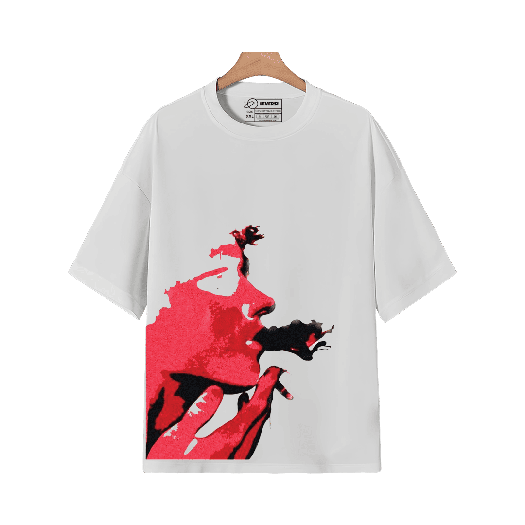 White graphic T-shirt on a hanger featuring a bold red artistic face illustration.