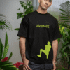 Man wearing a black oversized T-shirt with a neon green JACKBOYS logo on the chest and a bold silhouette graphic near the hem.