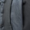 Close-up texture of black cotton fleece fabric with ribbed detailing.
